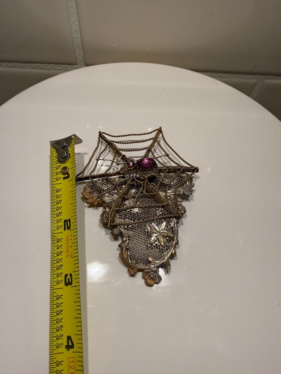 Vintage Metal Filigree Brooch with Purple Stone